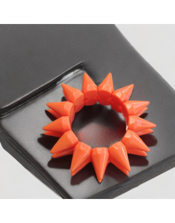 Bracelet en plastique à pics oranges