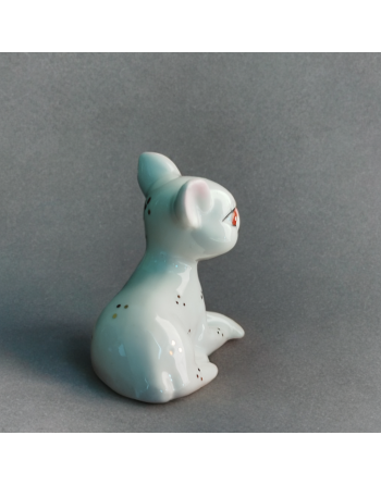 Faon en porcelaine, grands yeux rouges, décor points dorés